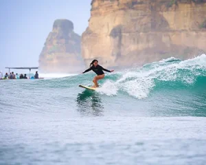 LMBK Surf House guest surfing Inside Gerupuk Kuta Lombok