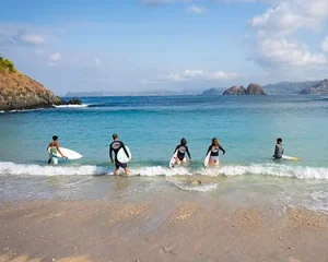 LMBK Surf House guests preparing to surf Mawi Kuta Lombok
